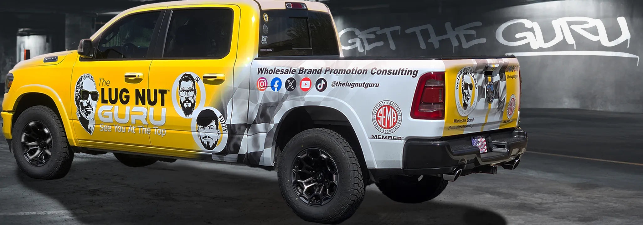 Yellow truck with caricature headshots of the sales team